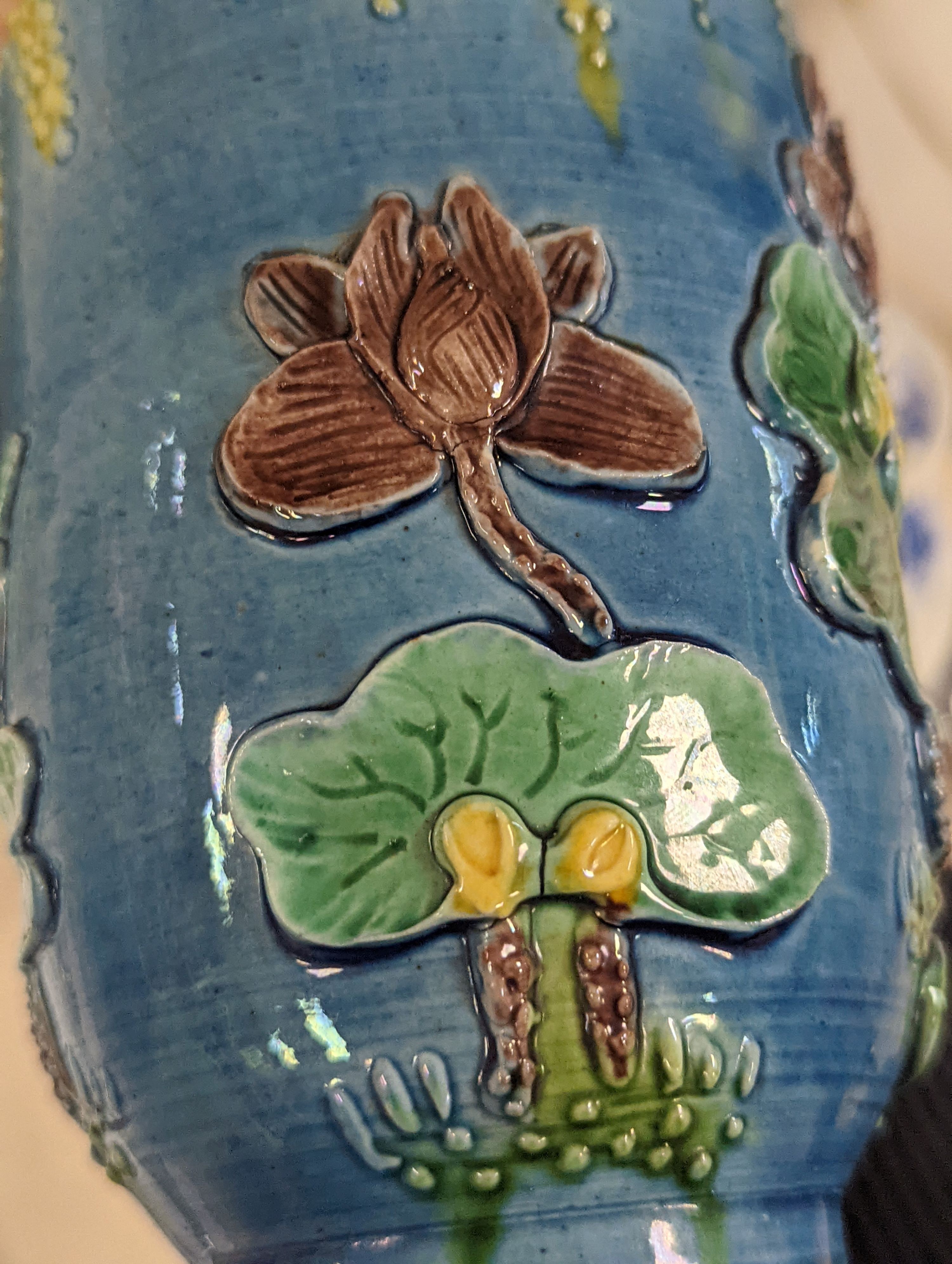 An early 20th century Chinese blue and white lidded vase together with a similar enamelled pottery vase and a Japanese blue and white dish. Tallest vase 29cm